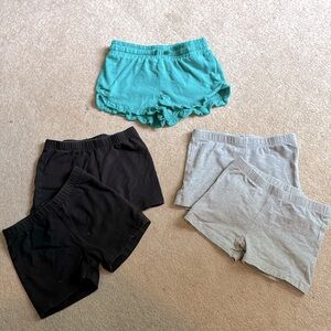 Five pair shorts girls size 6 grey black teal